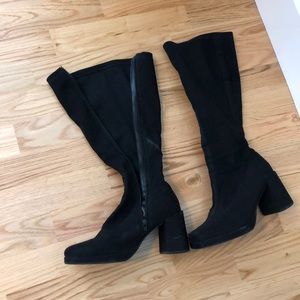 Tall stretch black boots. Wide-calf friendly!